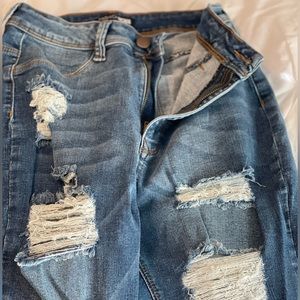 FashionNova ripped skinny jeans.